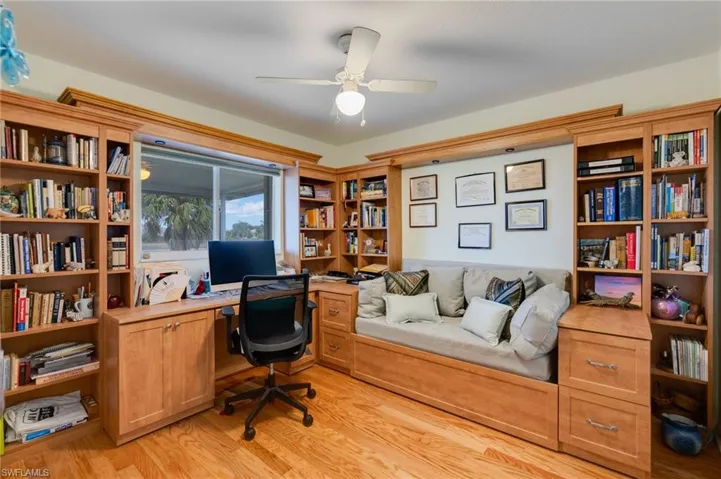 Office featuring light wood-type flooring and ceiling fan