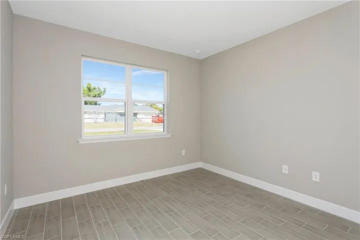Empty room featuring light hardwood / wood-style floors