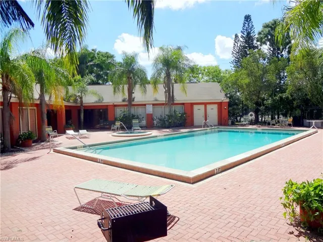 View of swimming pool featuring central AC and a patio area