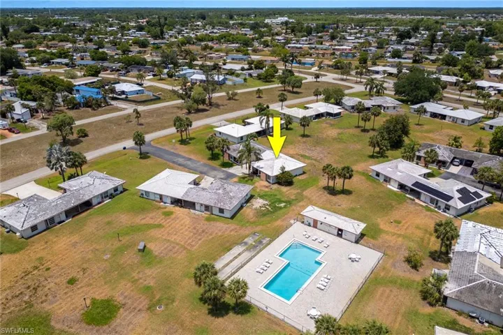 Aerial view of residential area with a pool area