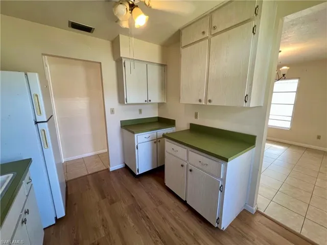 Kitchen featuring ceiling fan