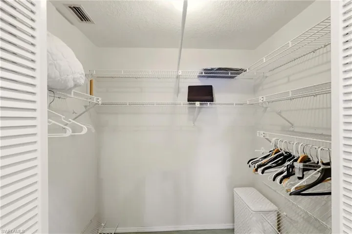 View of spacious walk-in closet