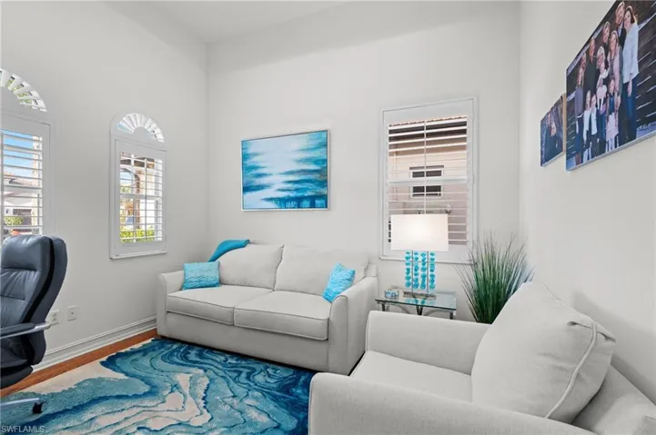 Office featuring baseboards and wood finished floors