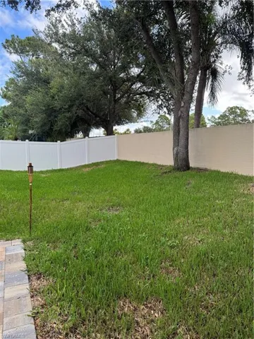 View of fenced backyard