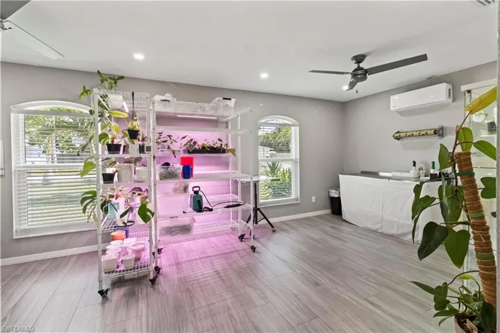 Office featuring ceiling fan, wood finished floors, and recessed lighting
