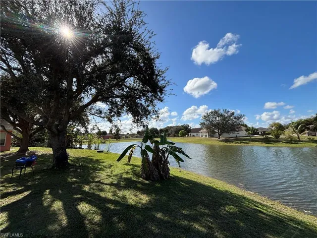 Water view with nearby suburban area