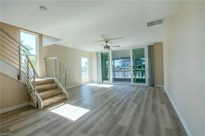 Livingroom to sunroom with water view
