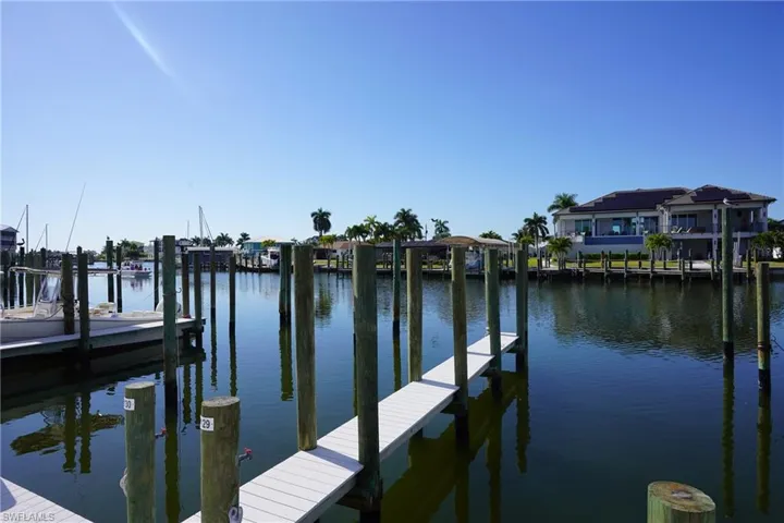 Dock featuring a water view