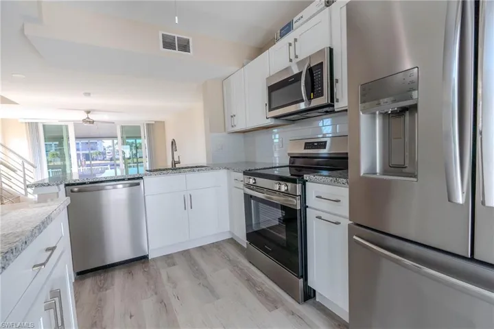 Kitchen view to waterfront dock area