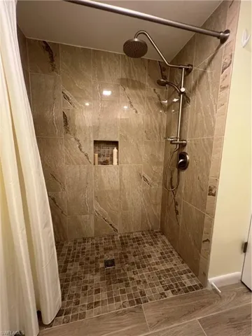 Bathroom featuring walk in shower