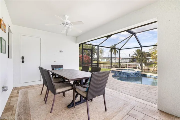 Spacious under truss lanai area & access to Pool Bath