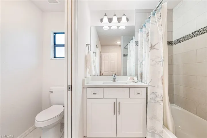 Secondary Full Bath private water closet and Tub & Shower