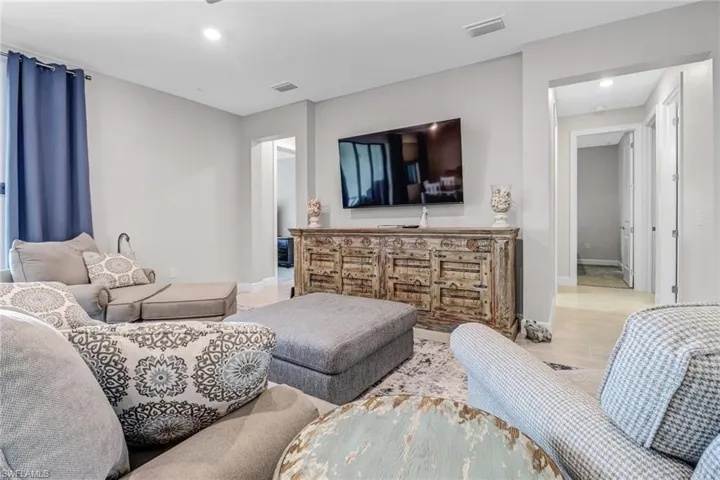 Living room with light wood-type flooring