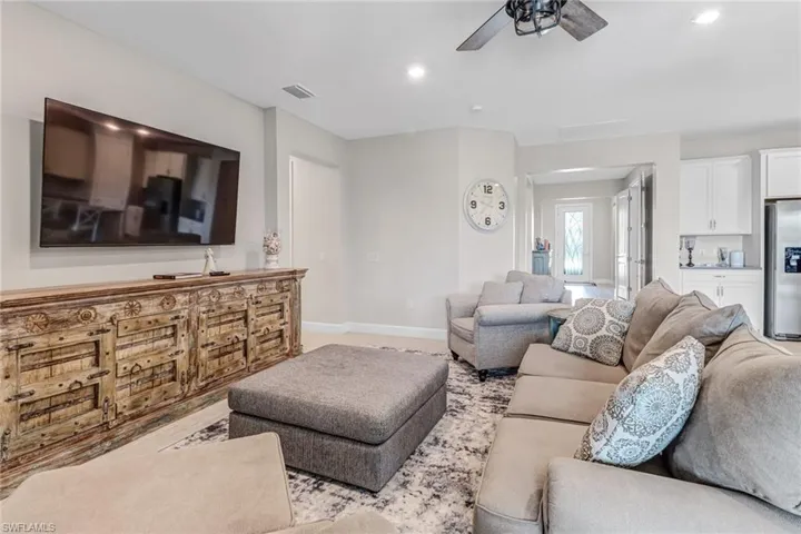 Living room featuring ceiling fan