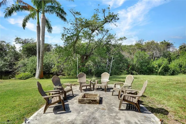 View of patio featuring a fire pit