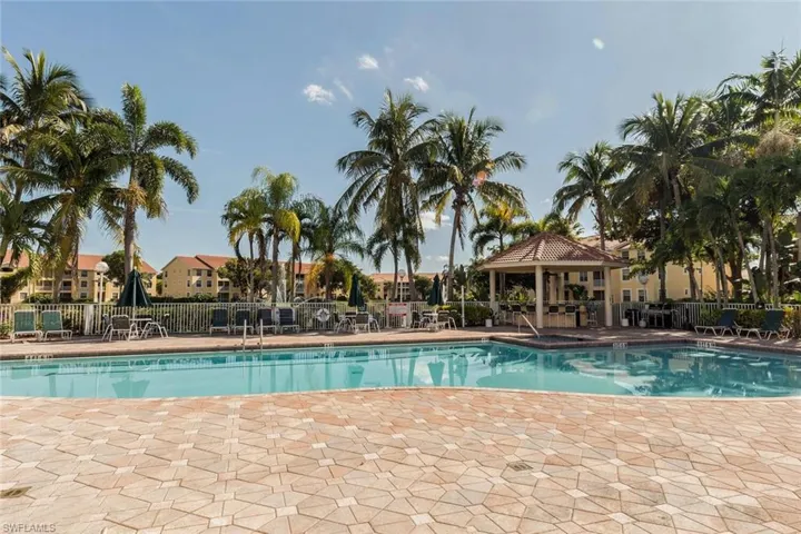 Community pool featuring a gazebo and a patio