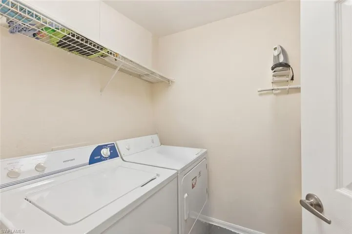 Laundry area featuring independent washer and dryer