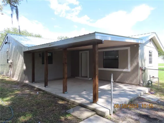 Rear view of house featuring a patio area