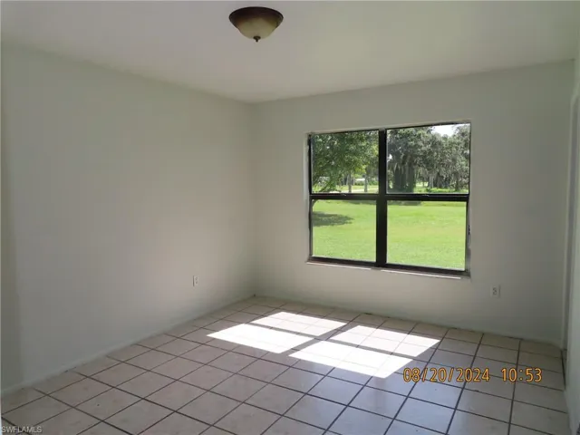 View of tiled spare room