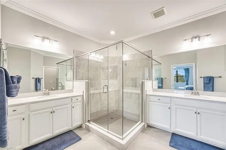 Primary bath with 2 vanities and large shower