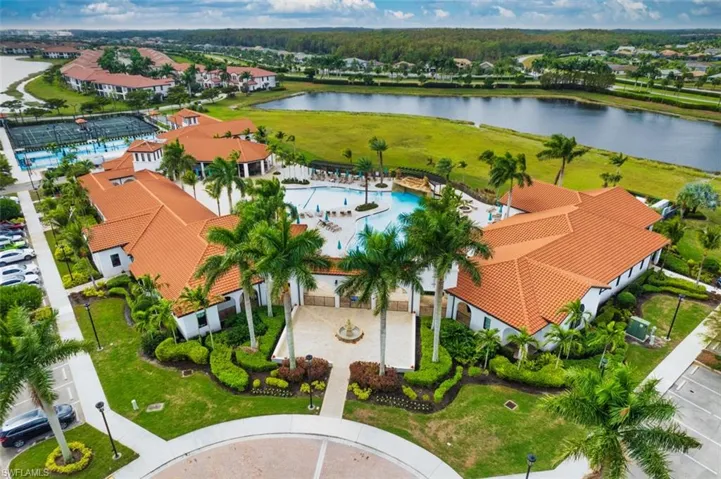 Bird's eye view of a pool area and a large body of water