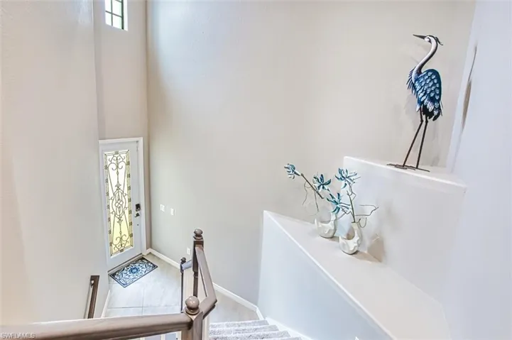 Foyer entrance featuring tile patterned flooring