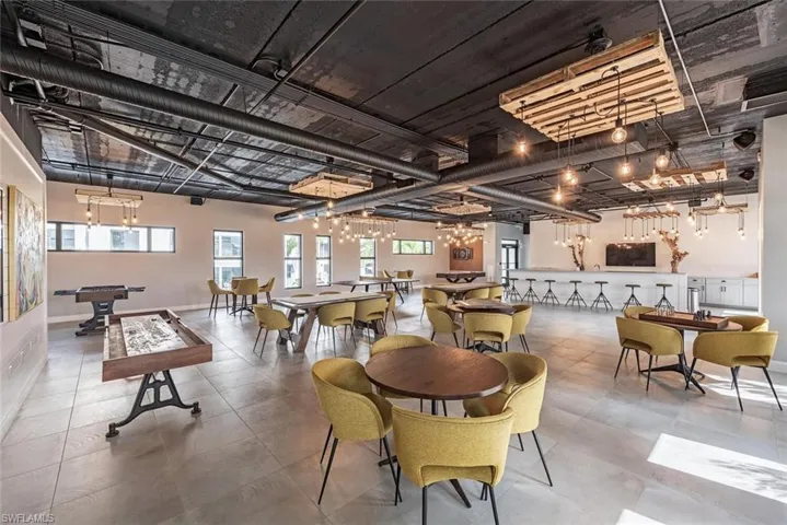 Tiled dining room with billiards