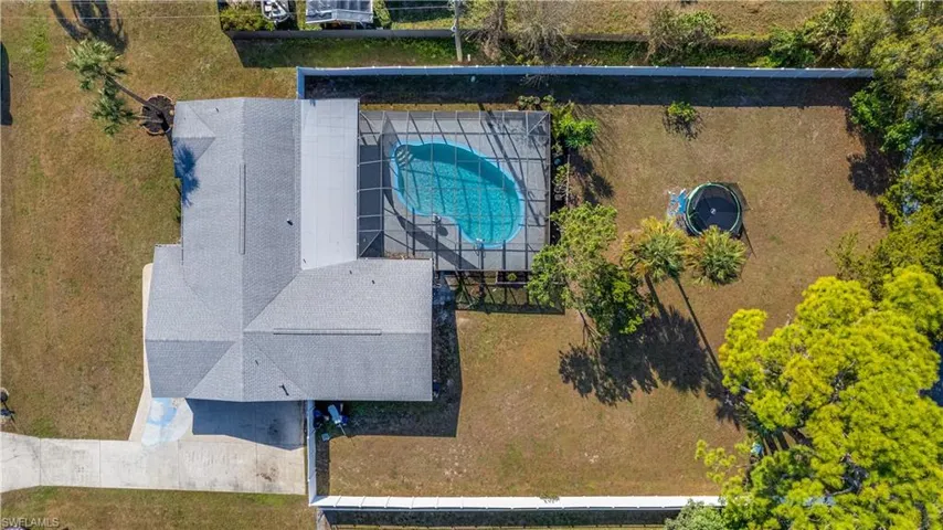 View from above of property featuring a pool area