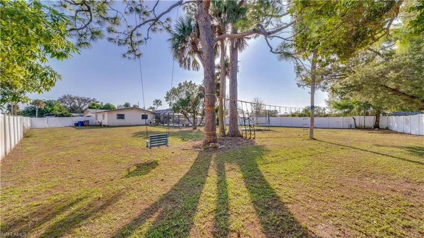 View of fenced backyard