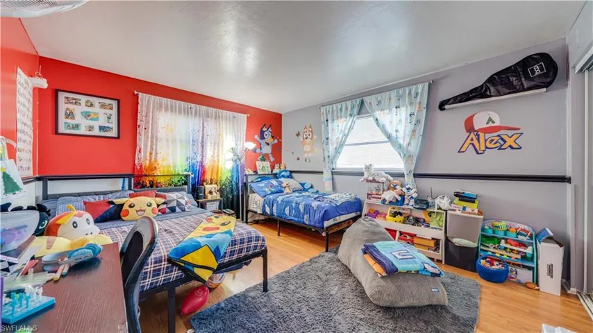 Bedroom featuring light wood-style flooring