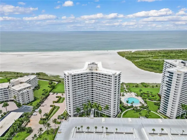Bird's eye view with a beach view and a water view