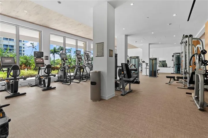 Gym featuring light colored carpet