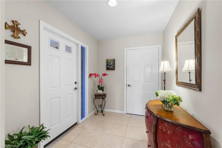 Foyer, door to right leads to garage