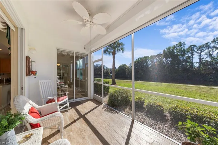 Screened lanai, w/door to back yard, and walking trail