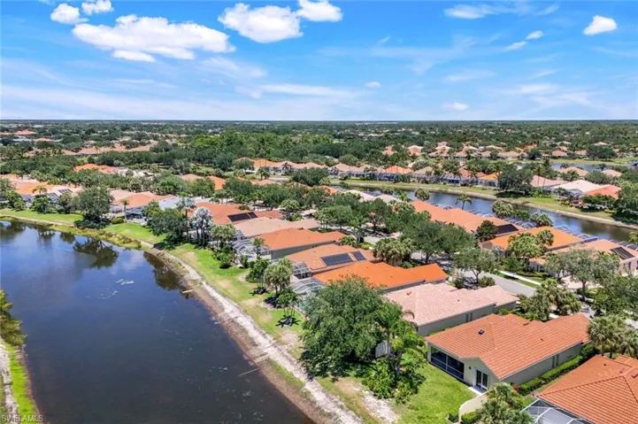 Aerial view of residential area with a large body of water