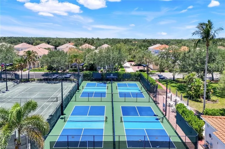 View of tennis court with fence