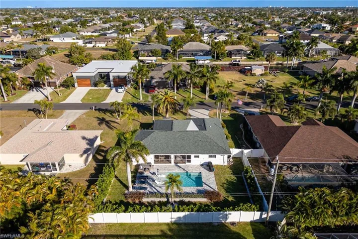Aerial view of residential area with a pool area
