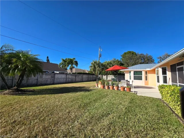 View of yard with a patio area