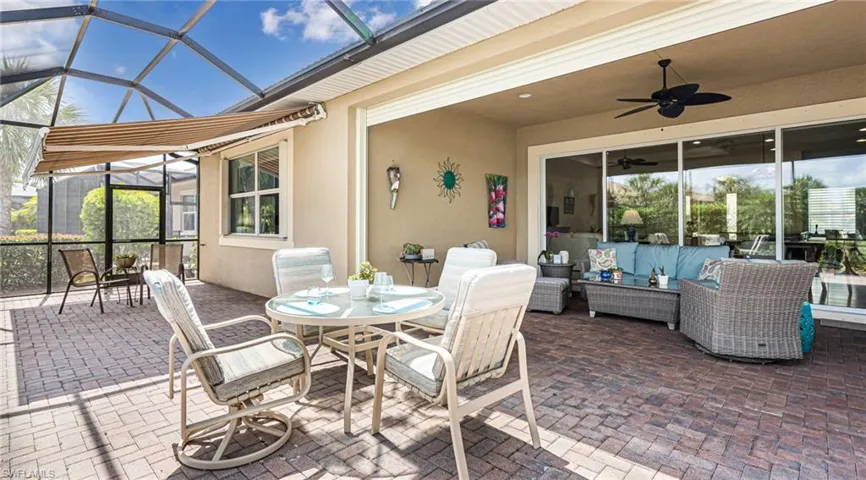 Expanded lanai with hurricane shutter and pavers
