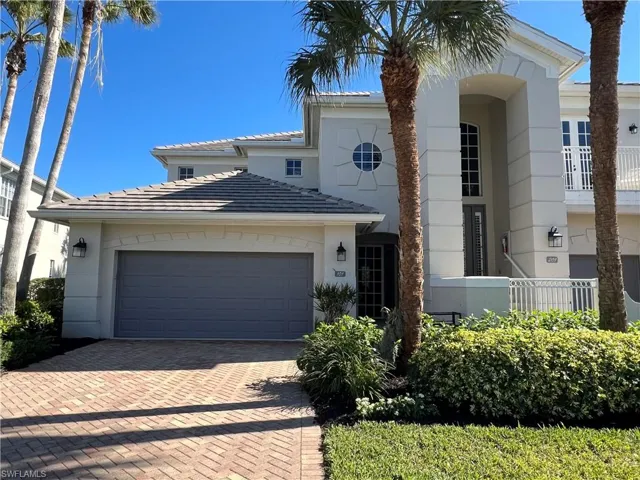 First floor, 2 bedrooms plus den, 2 full baths and one powder room, 2 car garage located on lot with a stunning panoramic lake view.