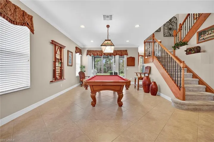 Playroom with ornamental molding, pool table, light tile patterned flooring, and recessed lighting