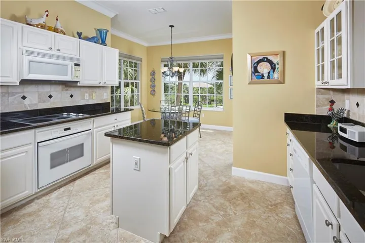 Food preparation or a morning cup of coffee the kitchen island is versatile.