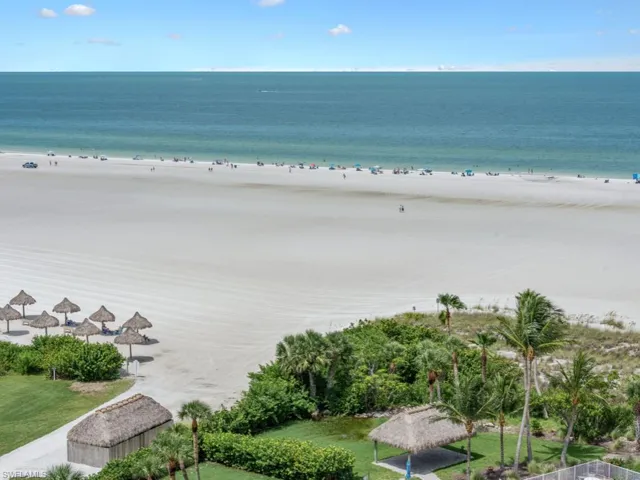 Water view featuring nearby beach and a gazebo