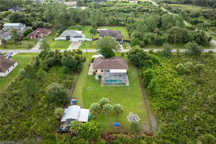 Drone / aerial view of a tree filled landscape