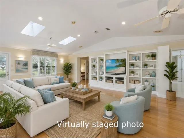 Vaulted ceiling with skylights and recessed lighting