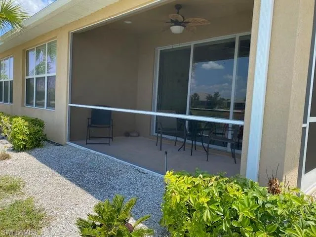 View of lanai with ceiling fan