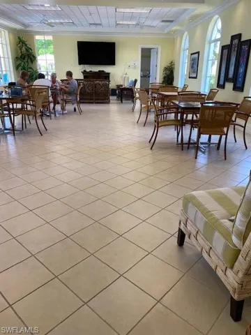 Community gathering area in main community center with library, fitness center,  computer room, catering kitchen