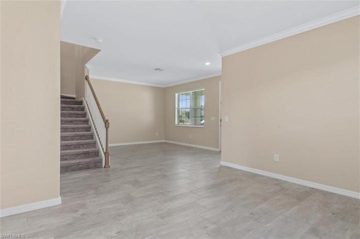 Formal dining looking into forma living room