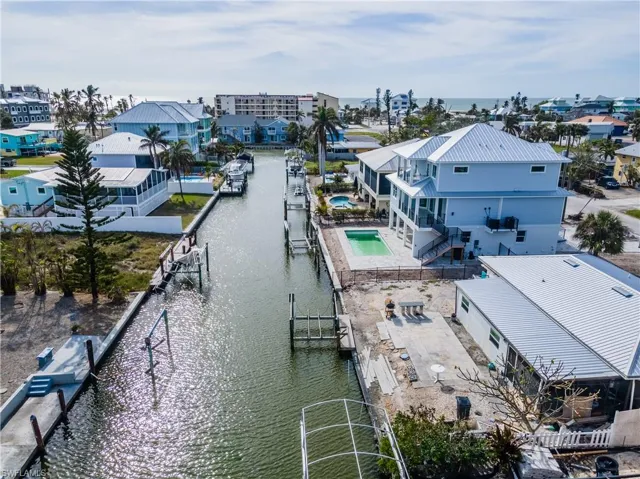 Aerial view of residential area with a nearby body of water
