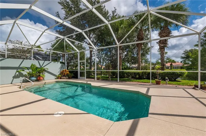 28847 Yellow Fin Tri, Bonita Springs FL 34135 - The ample pool deck can accommodate several loungers